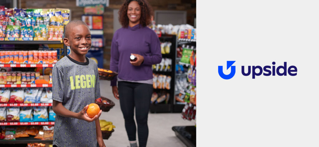 Young kid buying fruit at convenience store - Upside