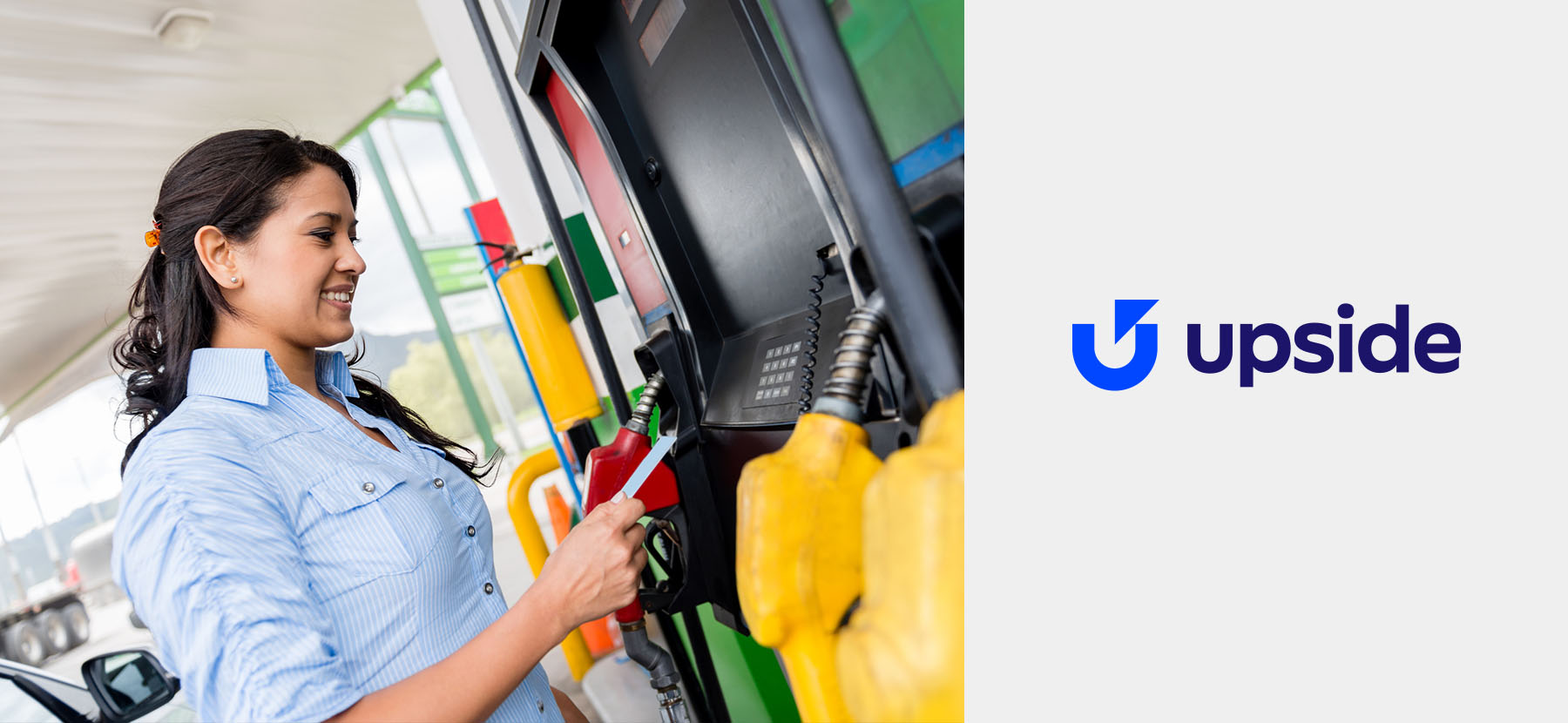 Woman paying for fuel at the pump.